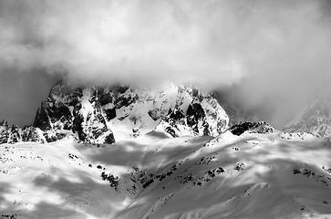Image showing Black and white view on Mount Ushba in fog at sun winter day
