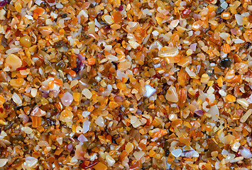 Image showing Multicolor sand on beach in sun summer day