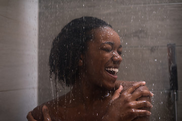 Image showing African American woman in the shower