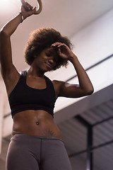 Image showing black woman doing dipping exercise