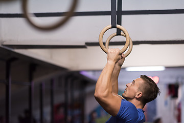 Image showing man doing dipping exercise