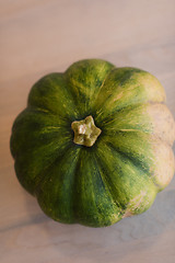 Image showing pumpkin on a wooden table