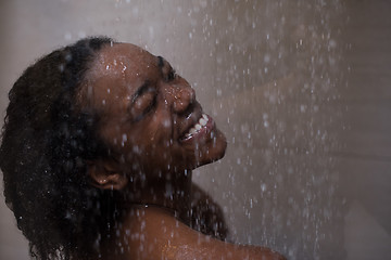 Image showing African American woman in the shower