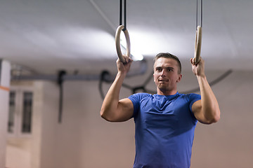 Image showing man doing dipping exercise