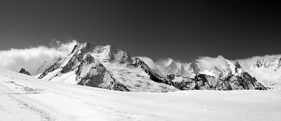 Image showing Black and white panorama on ski slope and winter mountains