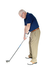 Image showing Senior practicing golf at home.