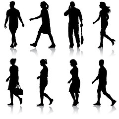 Image showing Set black silhouettes of beautiful man and woman on white background. illustration
