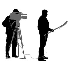 Image showing Cameraman with video camera. Silhouettes on white background