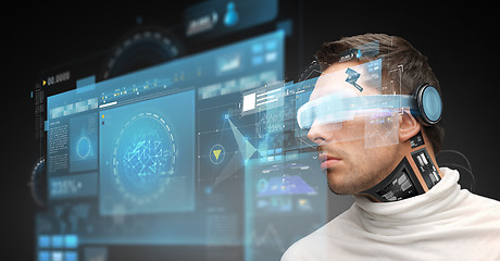 Image showing man in virtual reality glasses and microchip