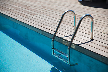 Image showing outdoor swimming pool ladder