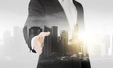 Image showing businessman with open hand ready for handshake