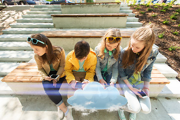 Image showing happy teenage friends with smartphones outdoors