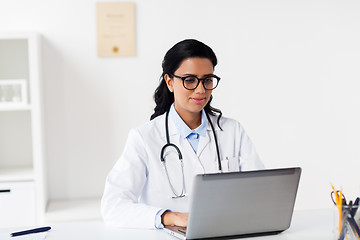 Image showing female doctor with laptop at hospital