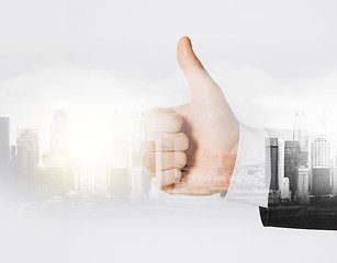 Image showing businessman hand showing thumbs up