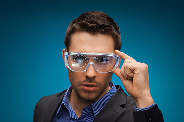 Image showing businessman in virtual reality or 3d glasses