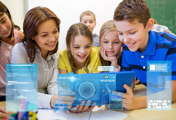 Image showing group of kids with teacher and tablet pc at school