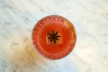 Image showing glass of cocktail with anise at bar