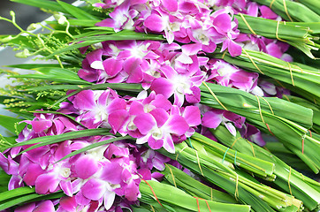 Image showing Bouquets of purple and white orchid flowers 