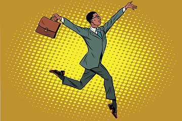 Image showing Elegant funny African businessman with briefcase running on tipt