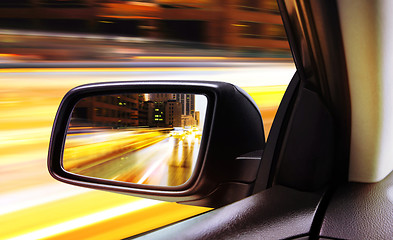 Image showing rear-view of moving car at night