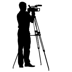 Image showing Cameraman with video camera. Silhouettes on white background