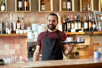 Image showing happy man or waiter with coffee and sugar at bar