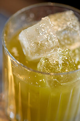 Image showing close up of glass with cocktail at bar