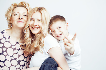 Image showing happy smiling family together posing cheerful on white background, lifestyle people concept, mother with son and teenage daughter isolated