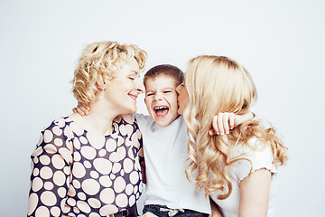 Image showing happy smiling family together posing cheerful on white background, lifestyle people concept, mother with son and teenage daughter isolated