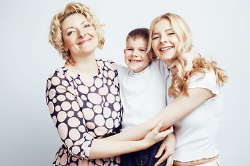 Image showing happy smiling family together posing cheerful on white background, lifestyle people concept, mother with son and teenage daughter isolated