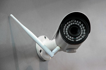 Image showing Wireless surveillance camera on the wall of the building