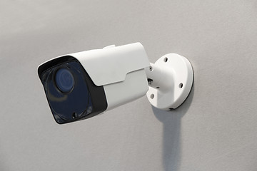 Image showing Wireless surveillance camera on the wall of the building