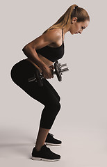 Image showing Working out with dumbbels