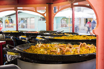 Image showing Seafood paella sold at street market stand