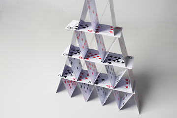 Image showing house of playing cards over white background