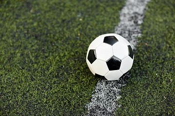 Image showing soccer ball on football field marking line