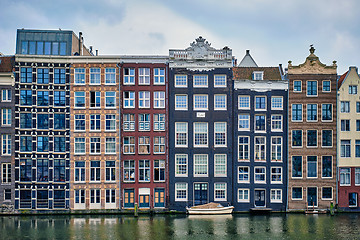 Image showing Amsterdam canal Damrak with houses, Netherlands