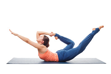 Image showing Sporty fit woman practices yoga asana Dhanurasana