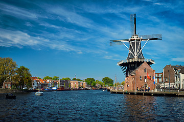 Image showing Harlem landmark  windmill De Adriaan on Spaarne river. Harlem,  