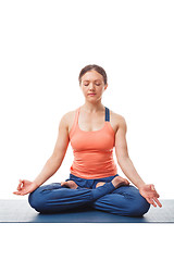 Image showing Woman meditating in yoga asana Padmasana Lotus pose