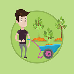 Image showing Man pushing wheelbarrow with plant.