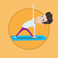 Image showing Man practicing yoga triangle pose.