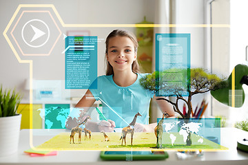 Image showing happy girl with tablet pc and notebook at home