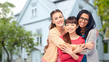 Image showing international group of happy women hugging