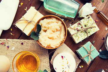 Image showing close up of body care cosmetic products on wood