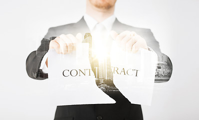 Image showing close up of businessman holding contract paper