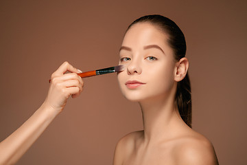 Image showing Beautiful female eyes with make-up and brush