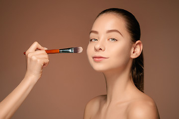 Image showing Beautiful female eyes with make-up and brush