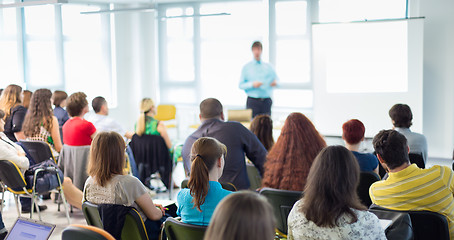 Image showing Speaker giving presentation on business conference.