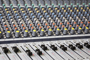 Image showing Professional Sound mixing console with knobs